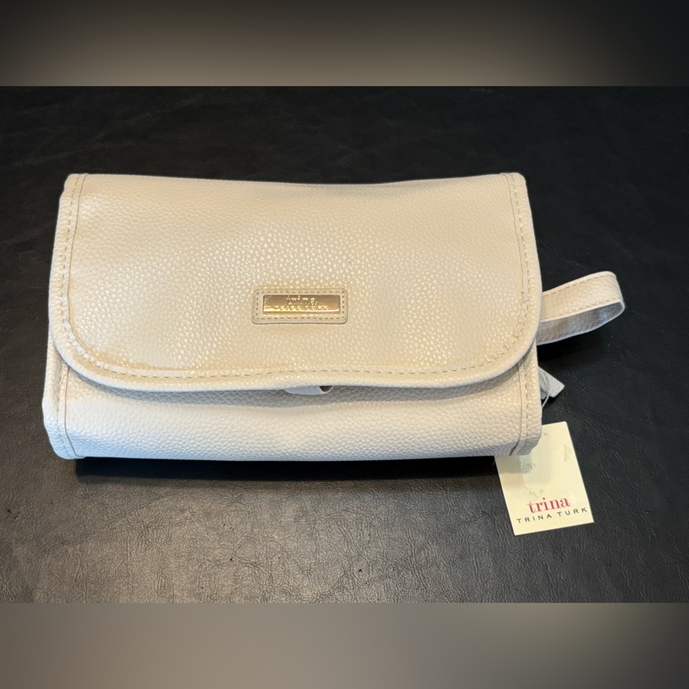 Trina Turk Ivory Faux Leather Travel Pouch. NWT